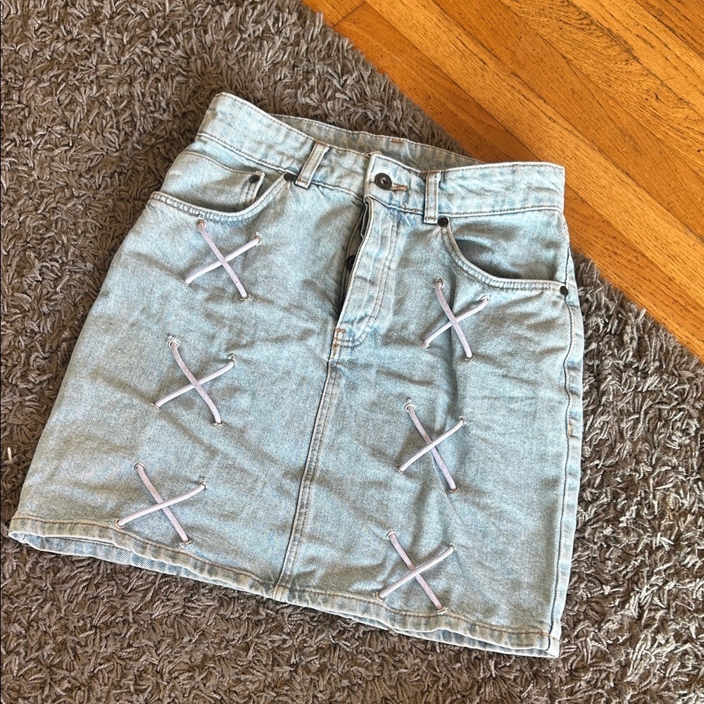 The Ragged Priest Trinity Light Wash Denim Mini Skirt with Lace-Up Details Small